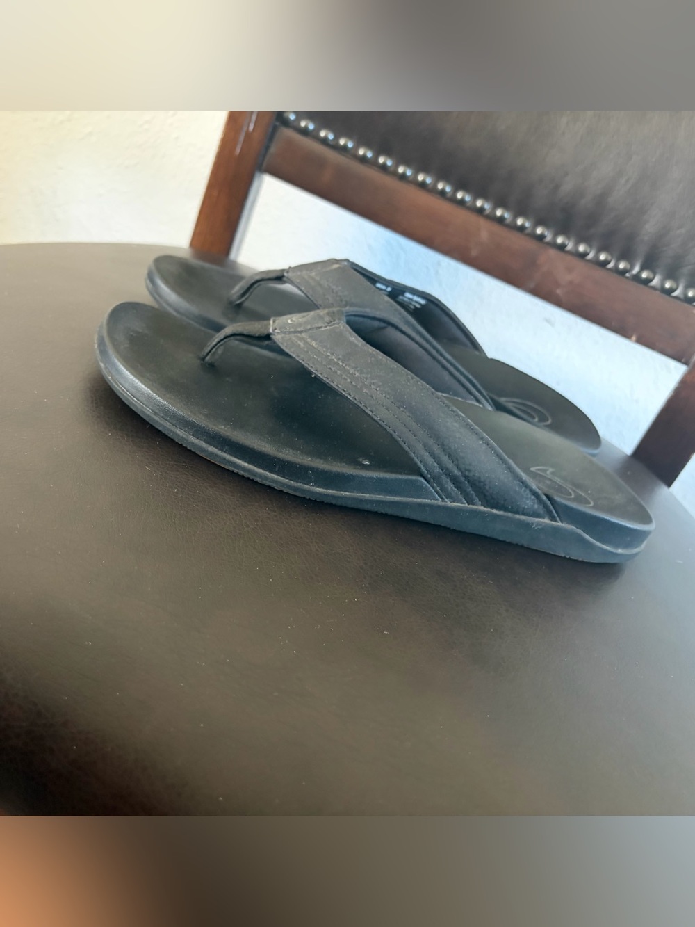 OluKai Men's Black Slip-On Flip Flops